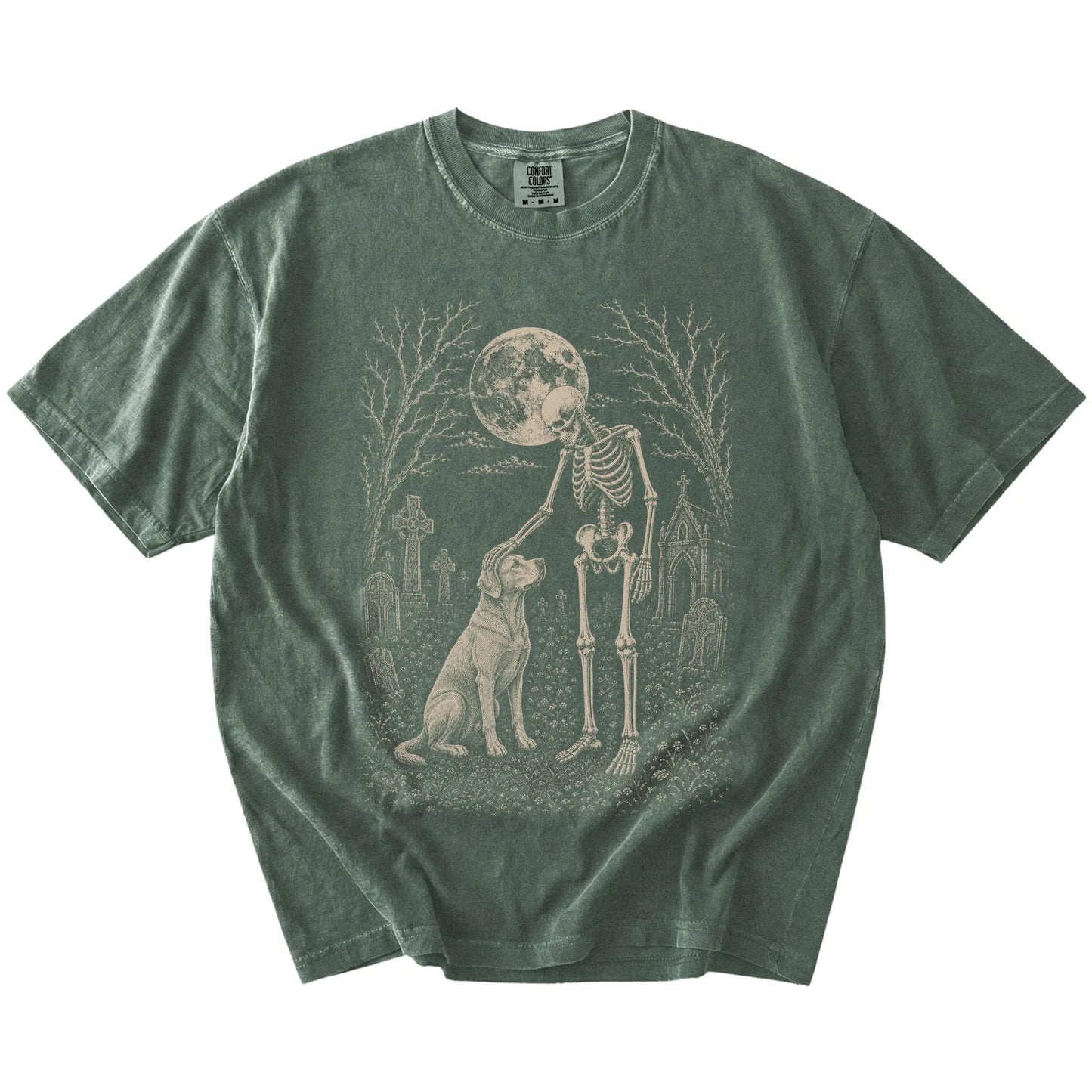 Labrador Retriever sharing a quiet cemetery moment with a friendly skeleton on a Moss Comfort Colors® T-shirt