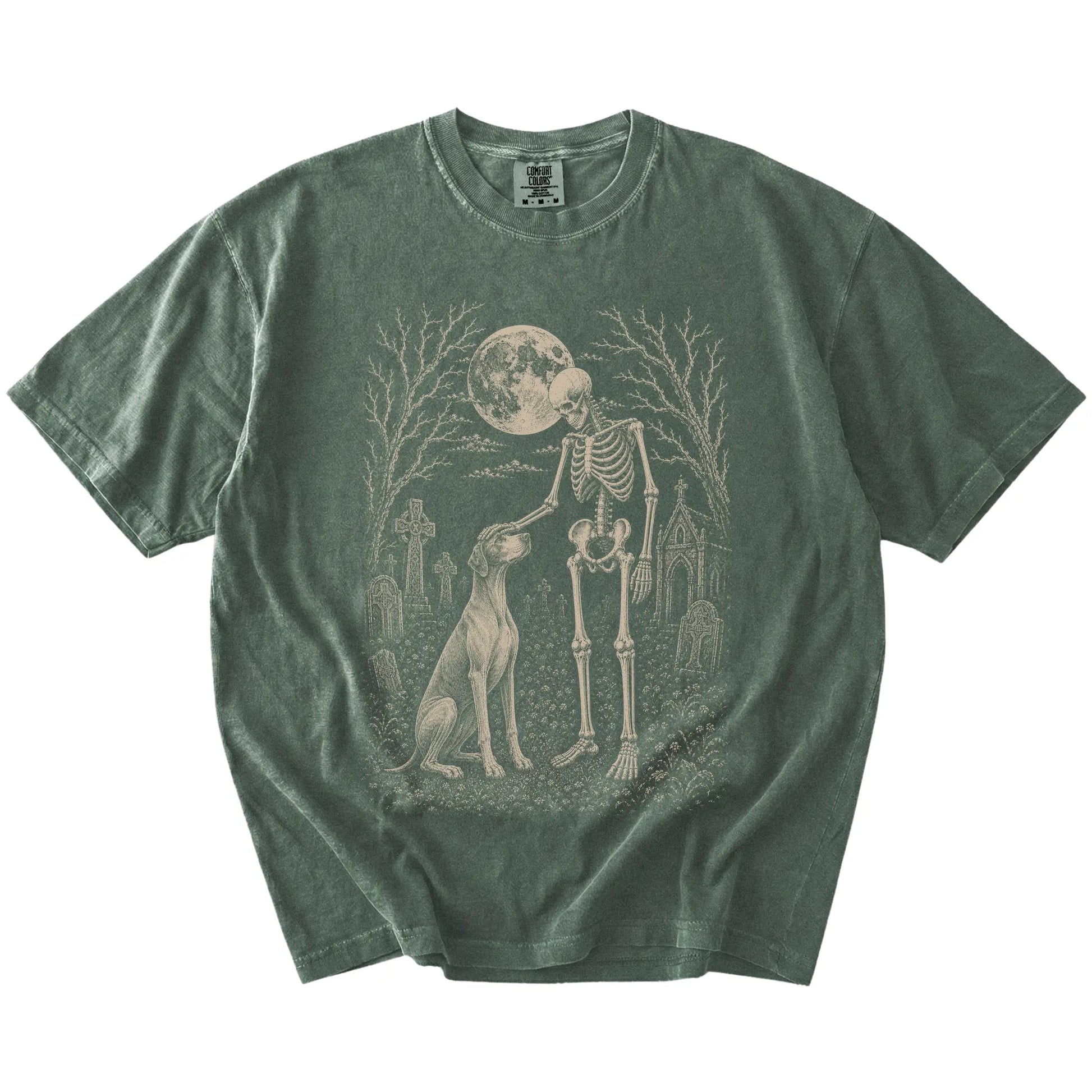 Pointer sharing a quiet cemetery moment with a friendly skeleton on a Moss Comfort Colors® T-shirt
