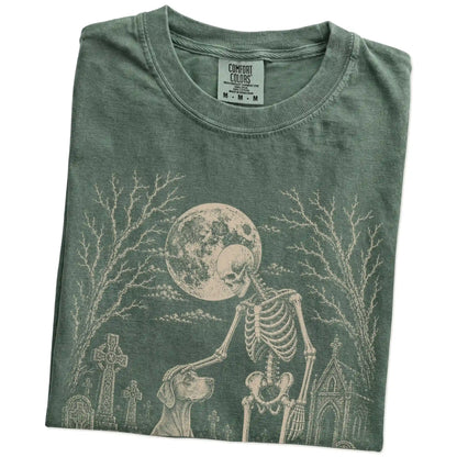 Folded Moss Comfort Colors® T-shirt showing Vizsla sharing a quiet cemetery moment with a friendly skeleton