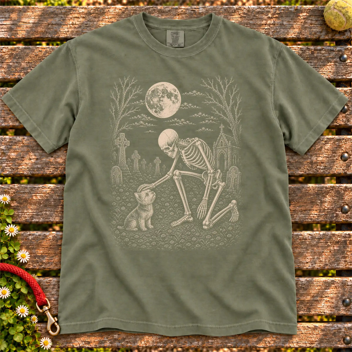 Yorkie sharing a quiet cemetery moment with a friendly skeleton on a Moss Comfort Colors® T-shirt