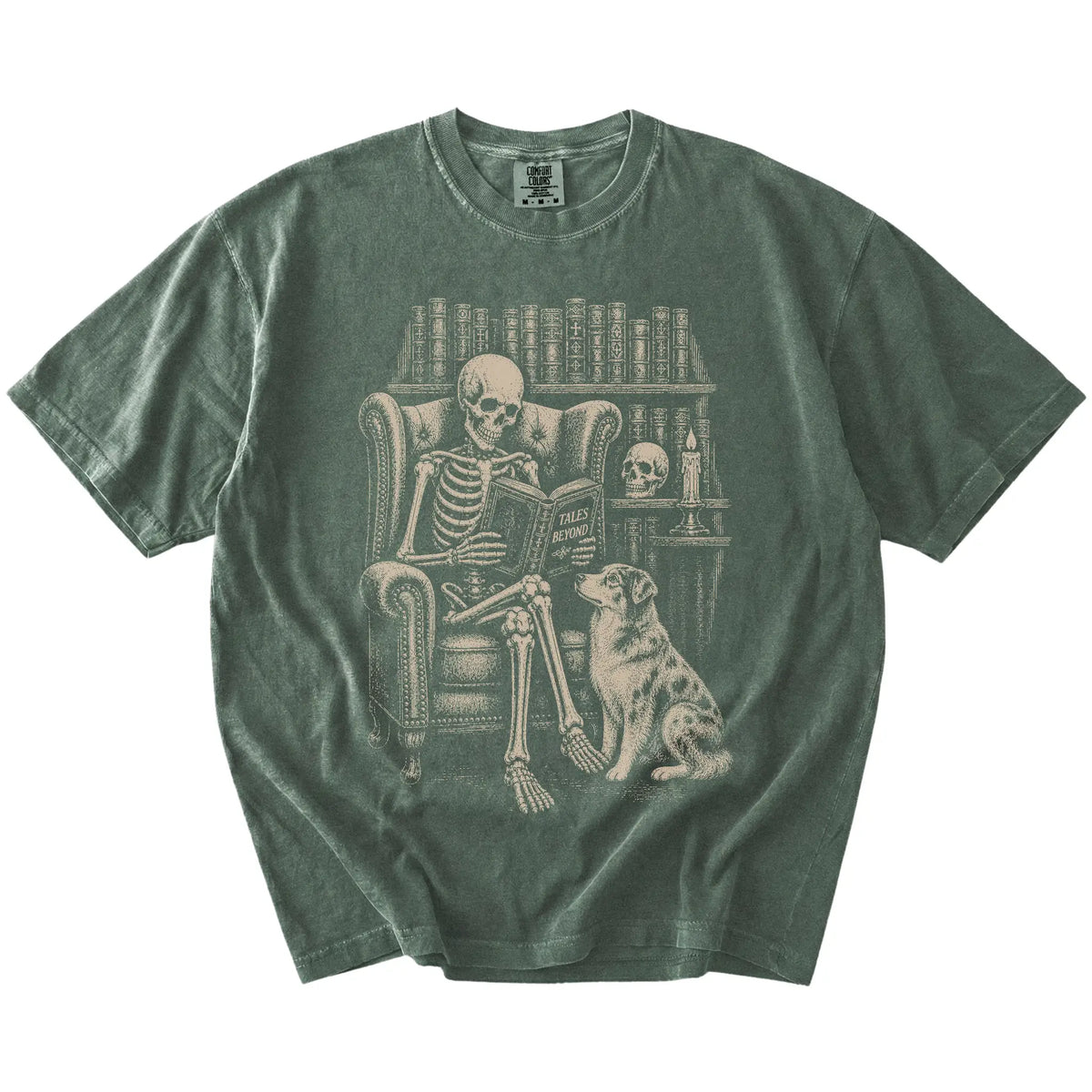Skeleton reading in a library beside a Australian Shepherd on a Moss Comfort Colors® T-shirt