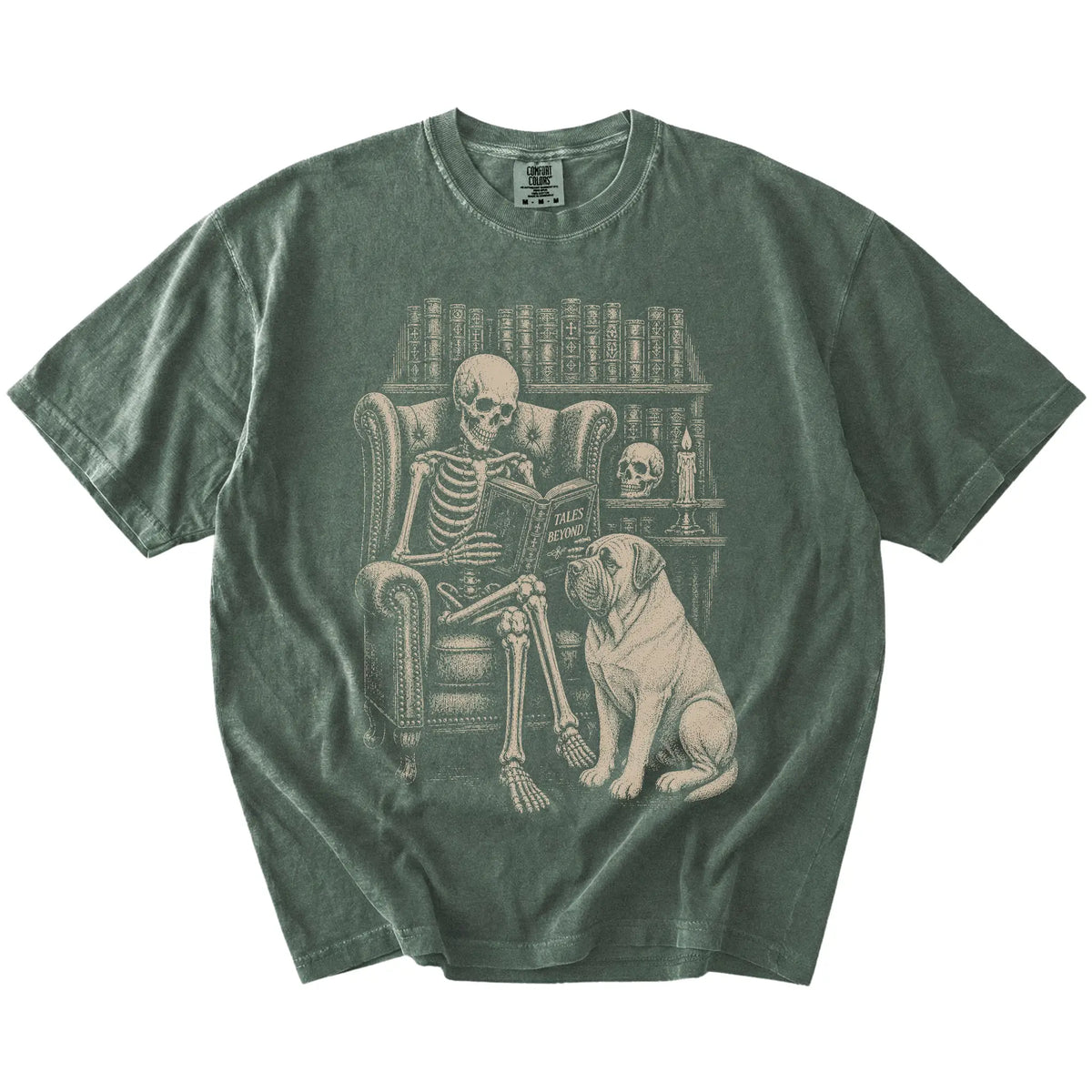 Skeleton reading in a library beside a Mastiff on a Moss Comfort Colors® T-shirt