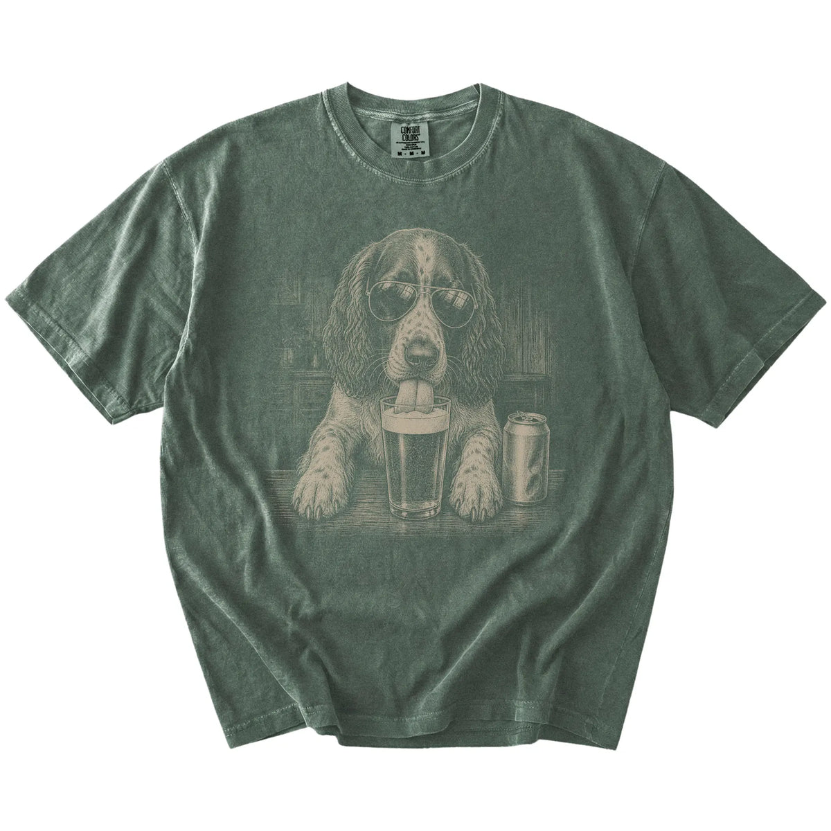 Springer Spaniel sneaking a drink from a foamy pint at home on a Moss Comfort Colors® t-shirt