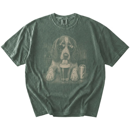 Springer Spaniel sneaking a drink from a foamy pint at home on a Moss Comfort Colors® t-shirt