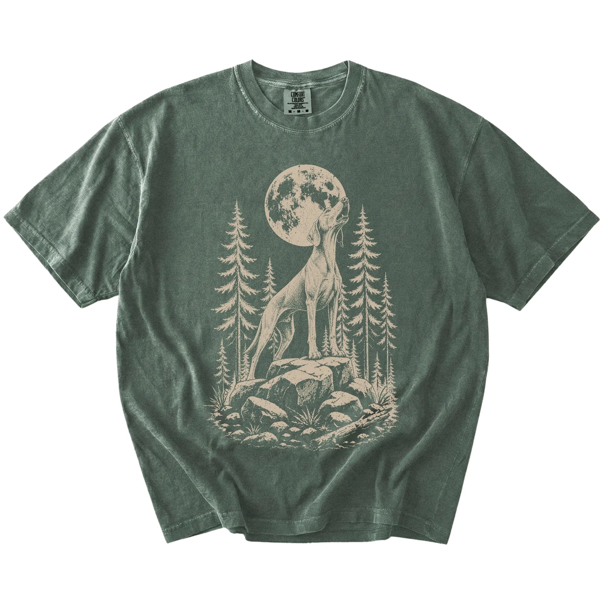 Weimaraner howling beneath the moon and pine trees on a Moss Comfort Colors® T-shirt
