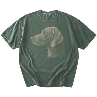 A detailed photographic portrait of a Weimaraner on a Moss Comfort Colors® T-shirt