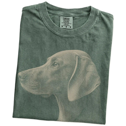 Folded Moss Comfort Colors® T-shirt showing a detailed photographic portrait of a Weimaraner