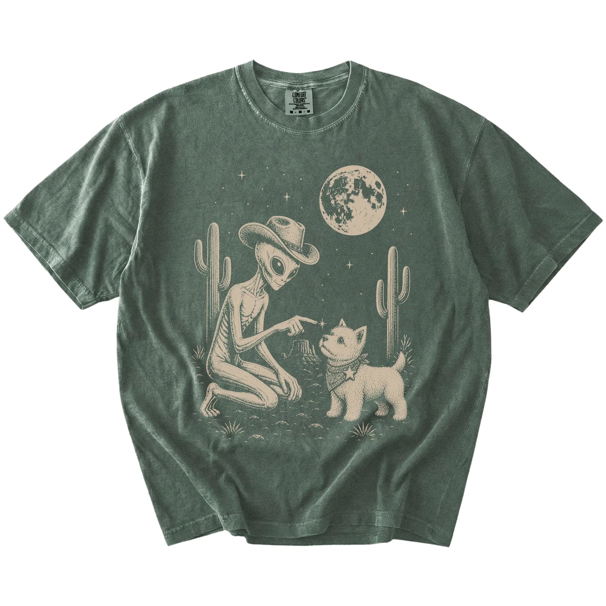 Cowboy alien fist-bumping a Westie beneath the moon on a Moss Comfort Colors® T-shirt
