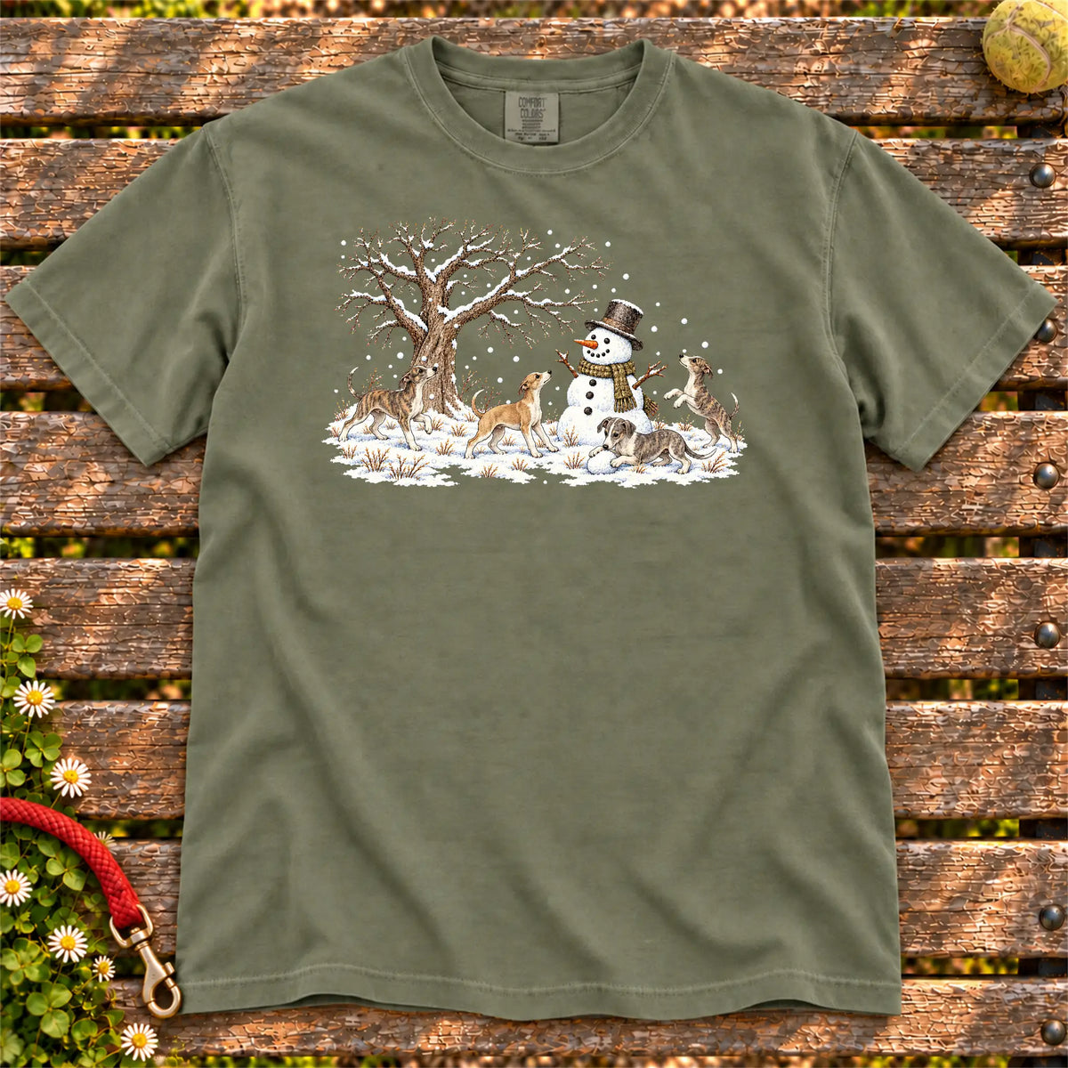 Whippet puppies playing in snow with a snowman on a Moss T-shirt
