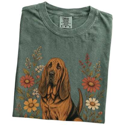 Folded Moss Comfort Colors® T-shirt showing Bloodhound portrait surrounded by wildflowers beneath the moon