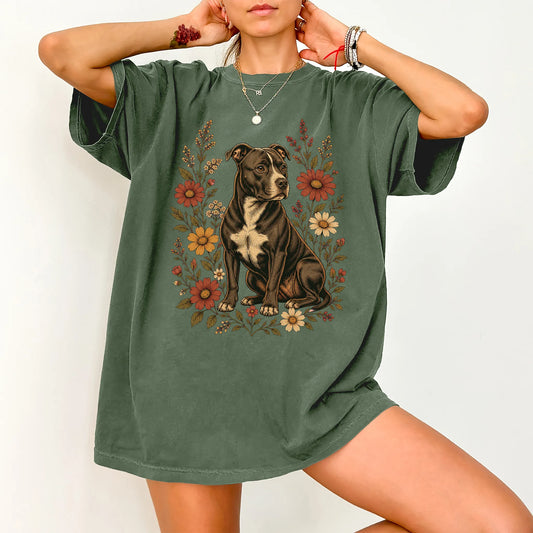 Model wearing a Moss Comfort Colors® T-shirt showing Pitbull portrait surrounded by wildflowers beneath the moon