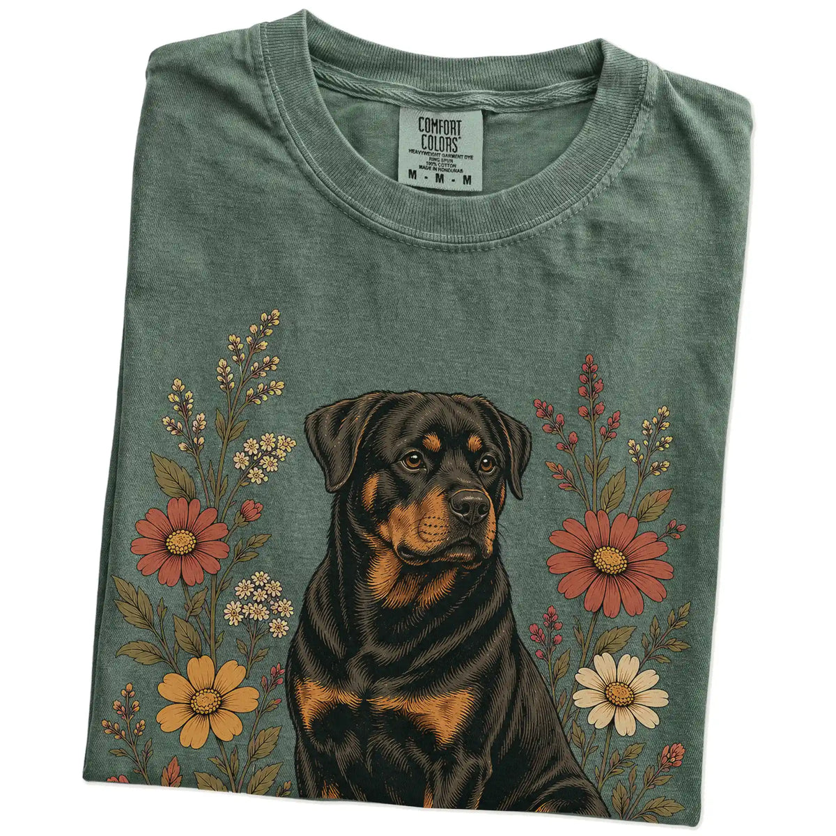 Folded Moss Comfort Colors® T-shirt showing Rottweiler portrait surrounded by wildflowers beneath the moon