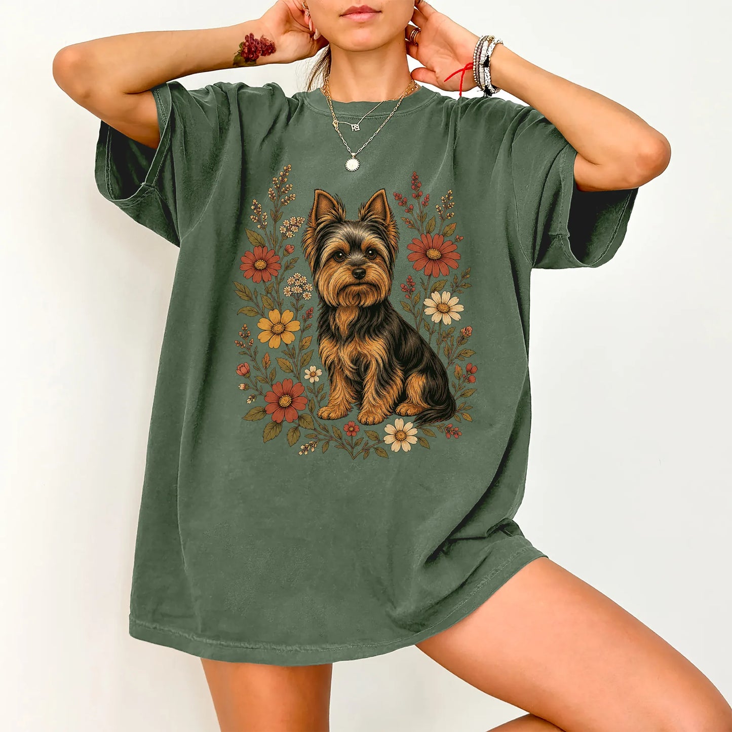 Model wearing a Moss Comfort Colors® T-shirt showing Yorkie portrait surrounded by wildflowers beneath the moon