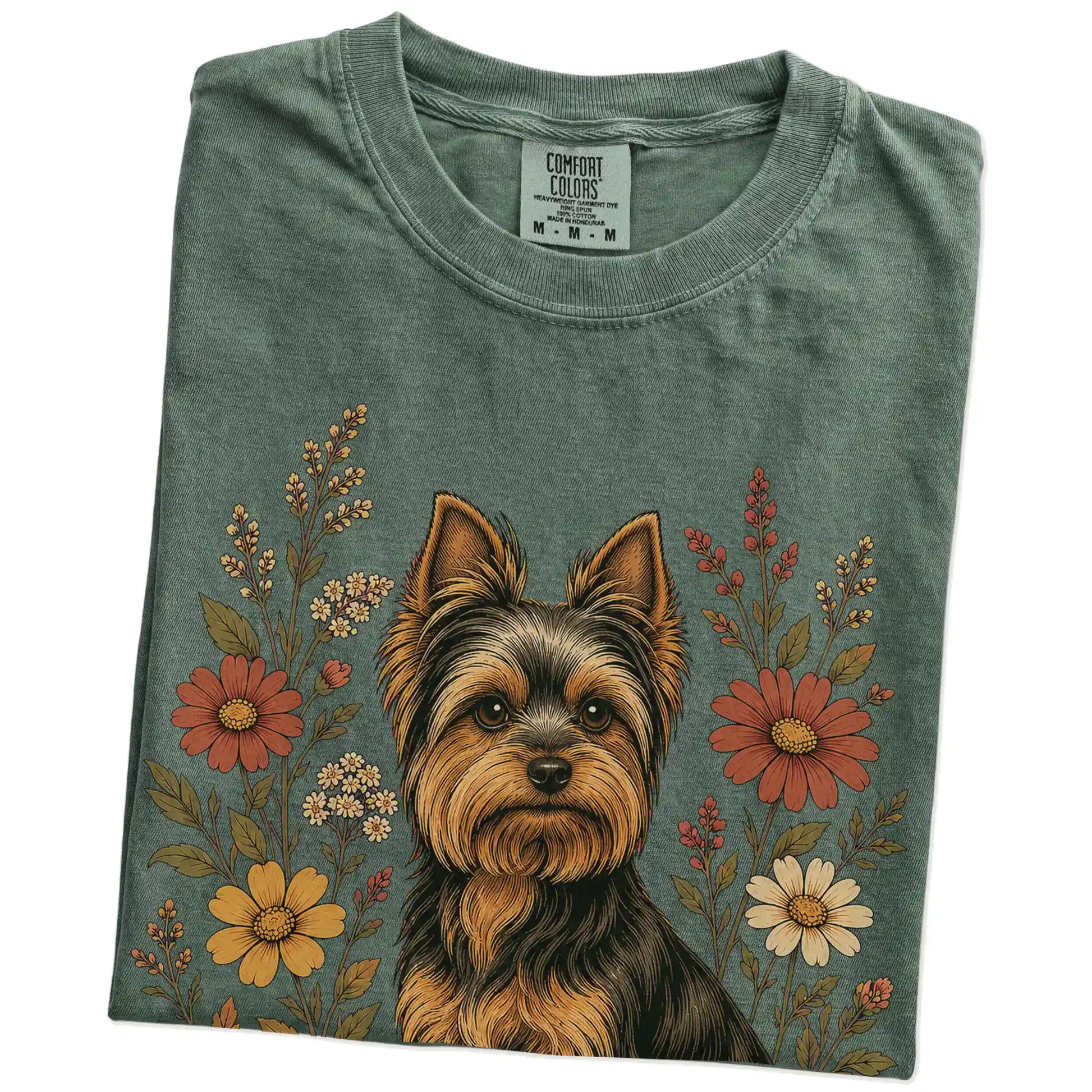 Folded Moss Comfort Colors® T-shirt showing Yorkie portrait surrounded by wildflowers beneath the moon