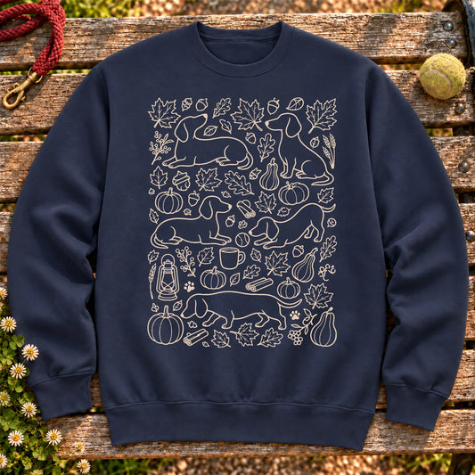Dachshund Autumn on a Navy crewneck sweatshirt, shown flat