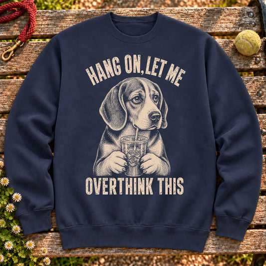Beagle Iced Coffee Overthink on a Navy crewneck sweatshirt, shown flat