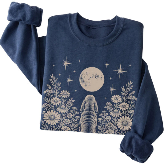 Navy crewneck sweatshirt featuring Wildflower Moon Bloodhound, folded presentation
