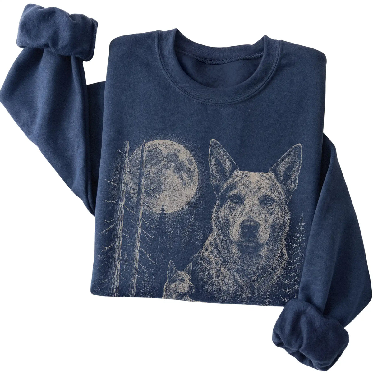 Folded navy crewneck sweatshirt showing the Blue Heeler Moonlit Forest graphic