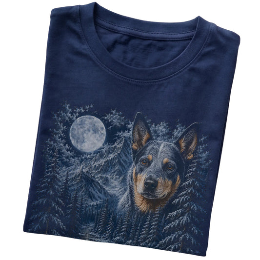 Folded navy T-shirt with Blue Heeler Winter Moon artwork.