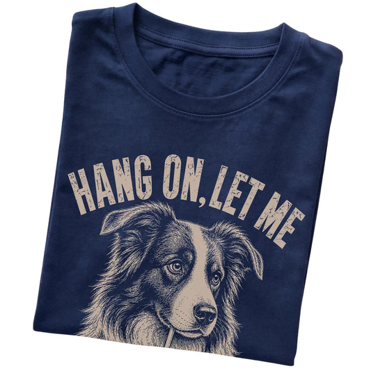 Navy T-shirt featuring Overthinking Border Collie, folded presentation