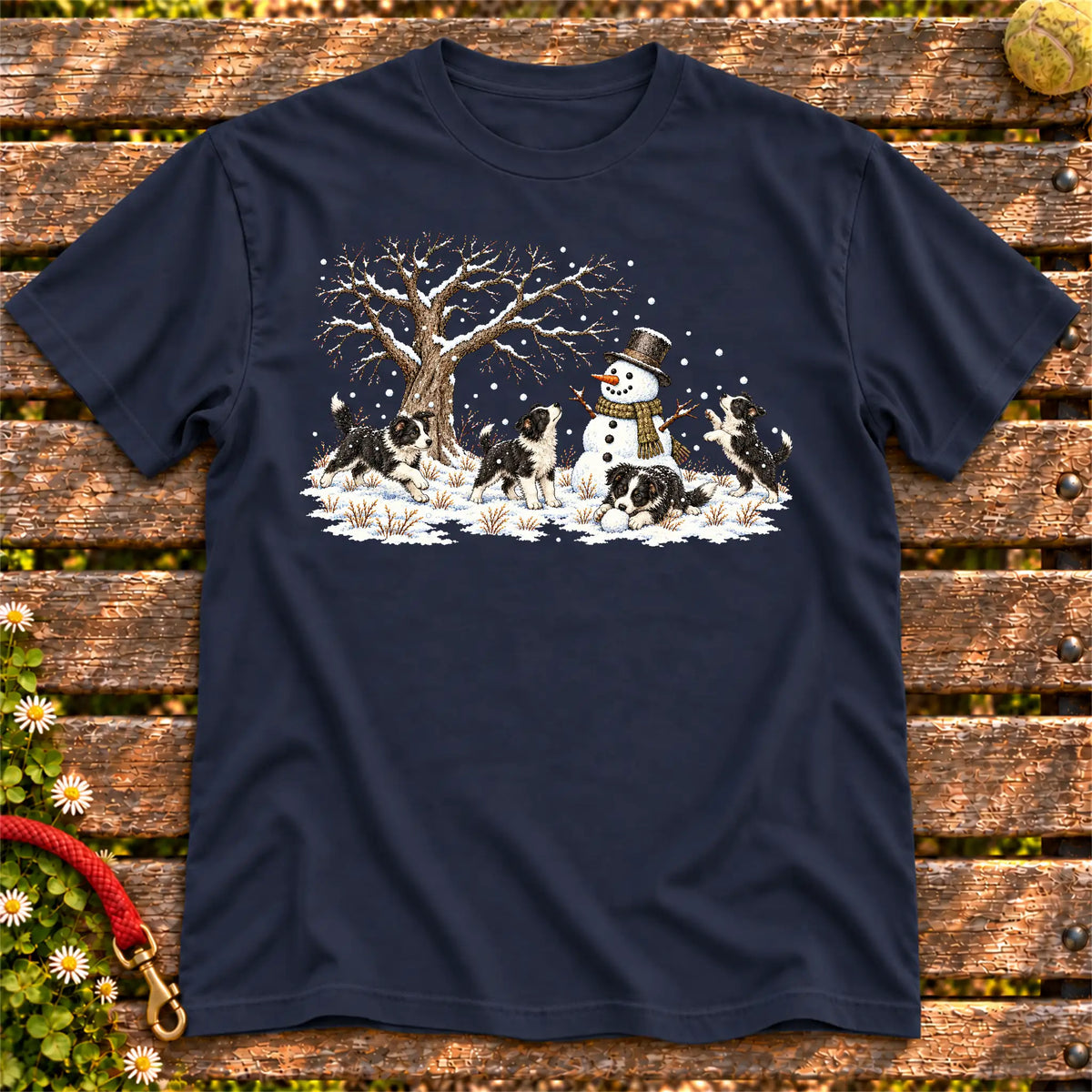 Border Collie puppies playing in snow with a snowman on a Navy T-shirt