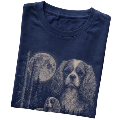 Folded navy Softstyle T-shirt showing the Cavalier King Charles Spaniel Moonlit Forest graphic