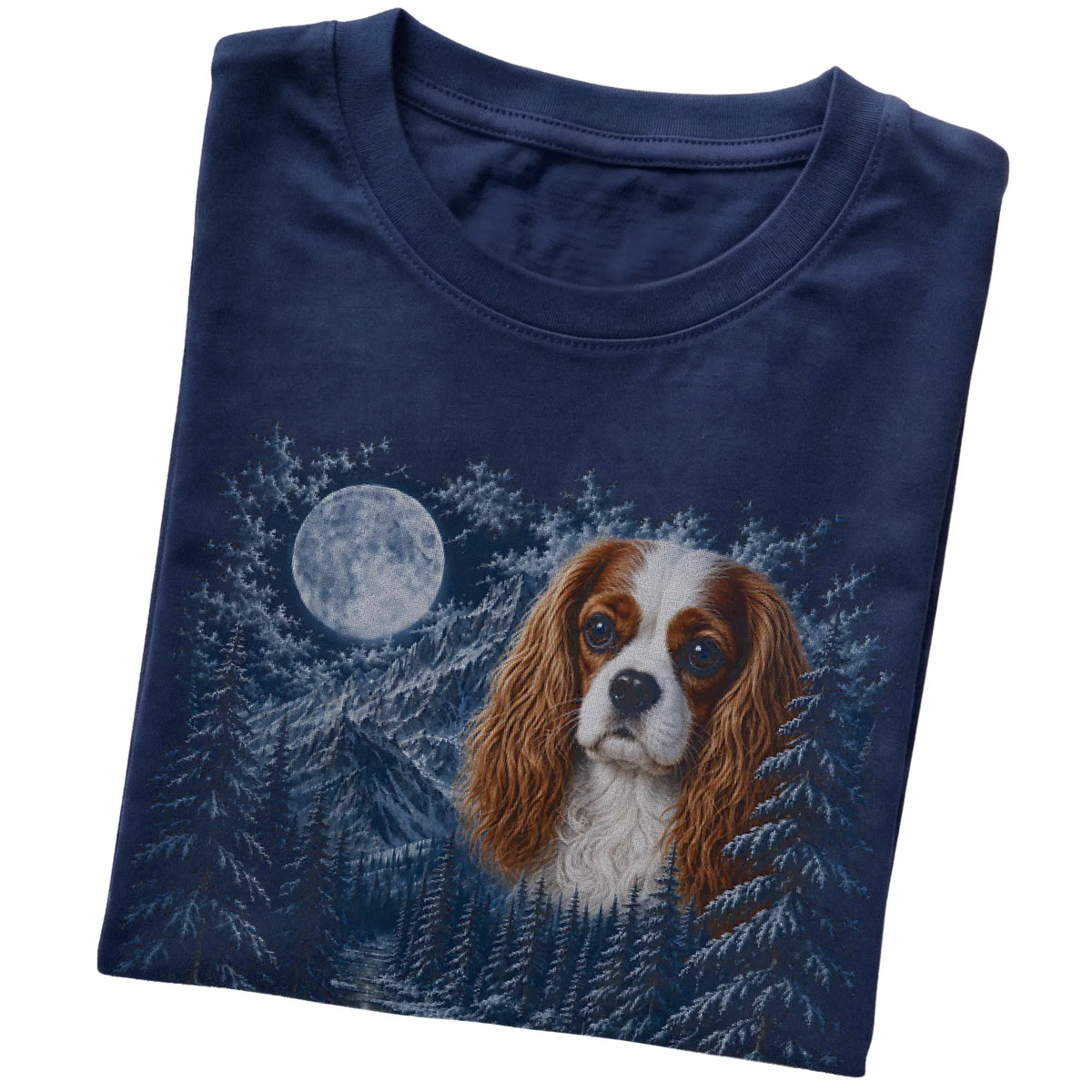 Folded navy T-shirt with Cavalier King Charles Spaniel Winter Moon artwork.