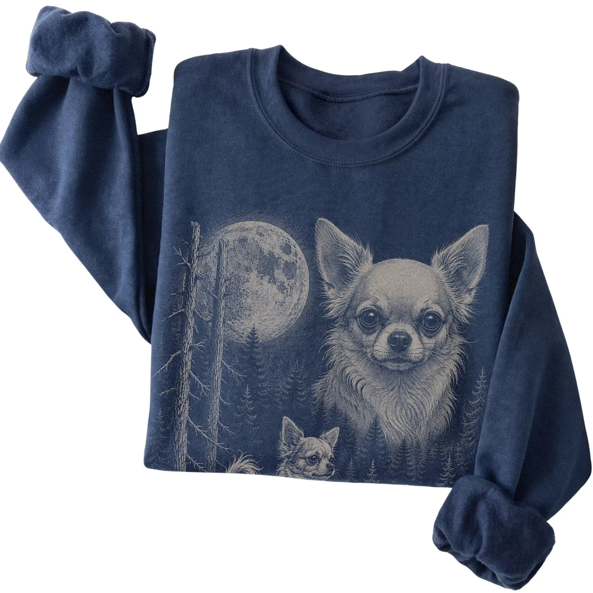 Folded navy crewneck sweatshirt showing the Chihuahua Moonlit Forest graphic