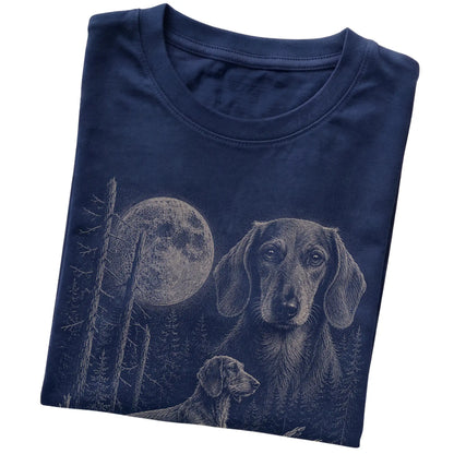 Folded navy Softstyle T-shirt showing the Dachshund Moonlit Forest graphic