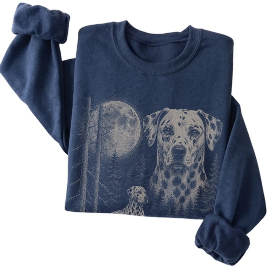 Folded navy crewneck sweatshirt showing the Dalmatian Moonlit Forest graphic