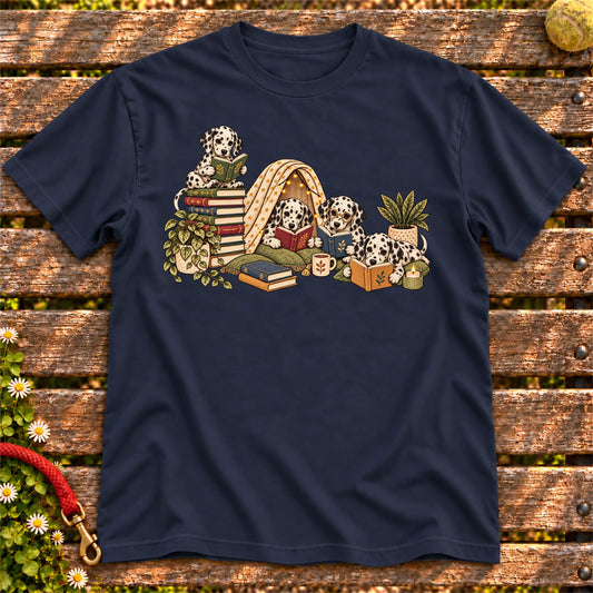 Dalmatian puppies reading books in a cozy blanket fort on a Navy T-shirt