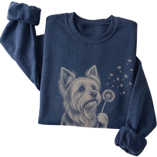 Navy crewneck sweatshirt featuring Dandelion Yorkie, folded presentation