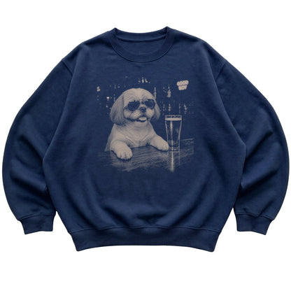 Navy Shih Tzu at a bar beside a pint, laid flat