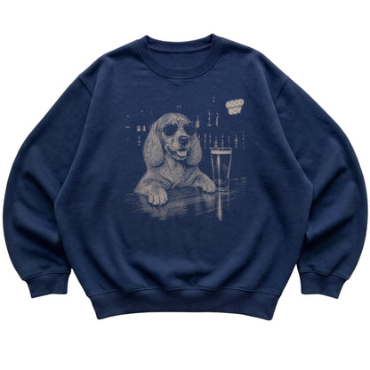 Navy Springer Spaniel at a bar beside a pint, laid flat