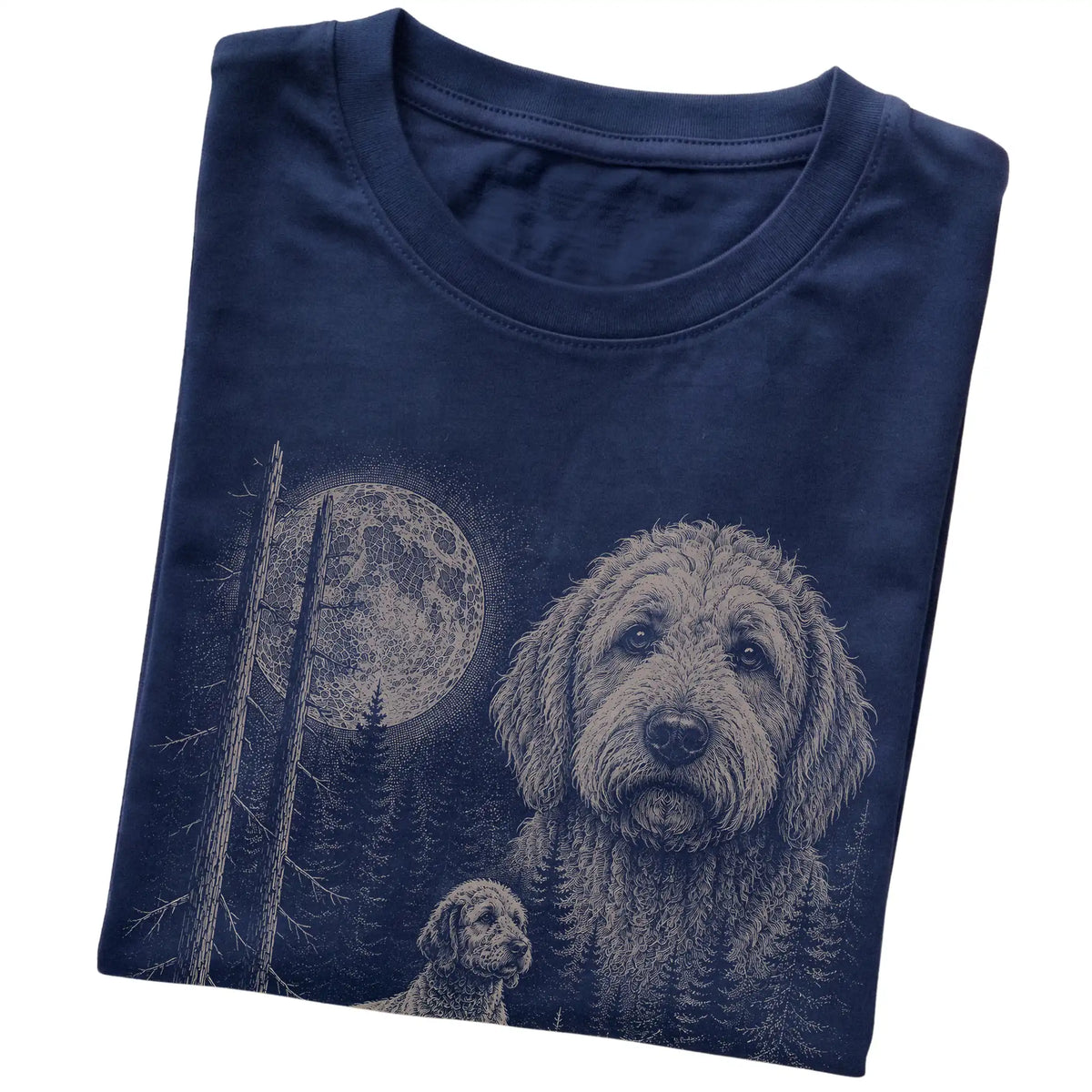Folded navy Softstyle T-shirt showing the Goldendoodle Moonlit Forest graphic