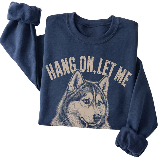 Navy crewneck sweatshirt featuring Overthinking Husky, folded presentation