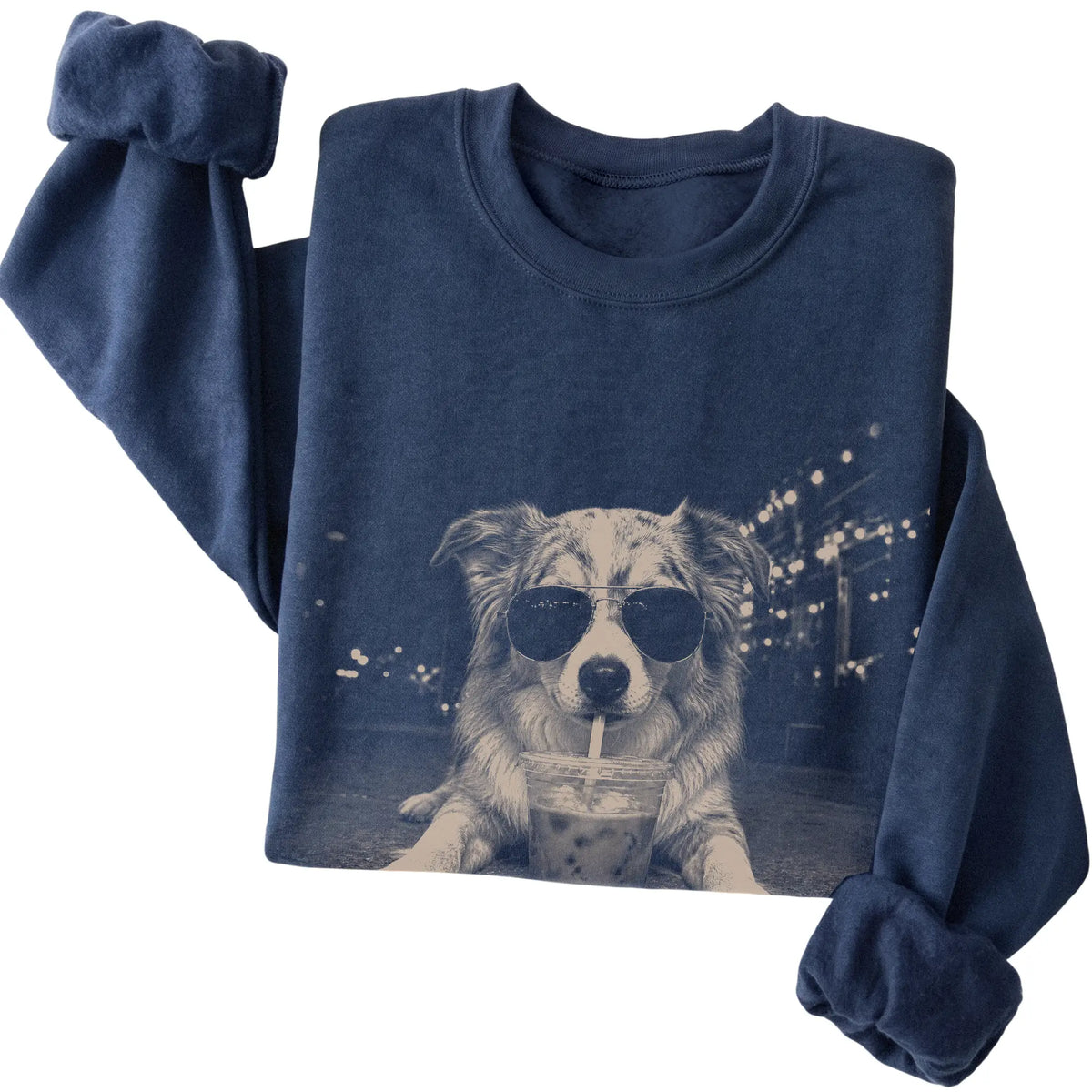 Australian Shepherd wearing aviator sunglasses and drinking iced coffee on a Navy Gildan Heavy Blend Crewneck Sweatshirt, folded view