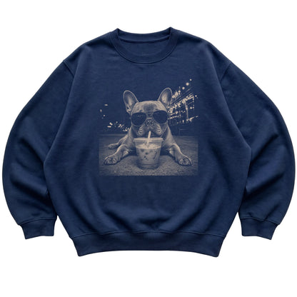 French Bulldog wearing aviator sunglasses and drinking iced coffee on a Navy Gildan Heavy Blend Crewneck Sweatshirt, flat lay view