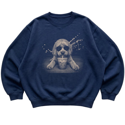 Labradoodle wearing aviator sunglasses and drinking iced coffee on a Navy Gildan Heavy Blend Crewneck Sweatshirt, flat lay view