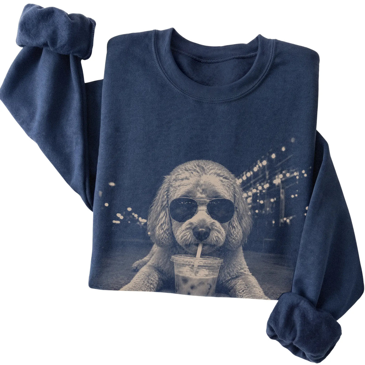 Labradoodle wearing aviator sunglasses and drinking iced coffee on a Navy Gildan Heavy Blend Crewneck Sweatshirt, folded view