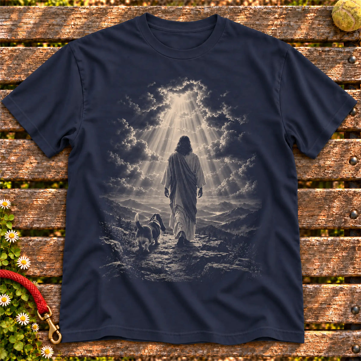 Navy T-shirt showing Jesus walking beside a Basset Hound beneath rays of light