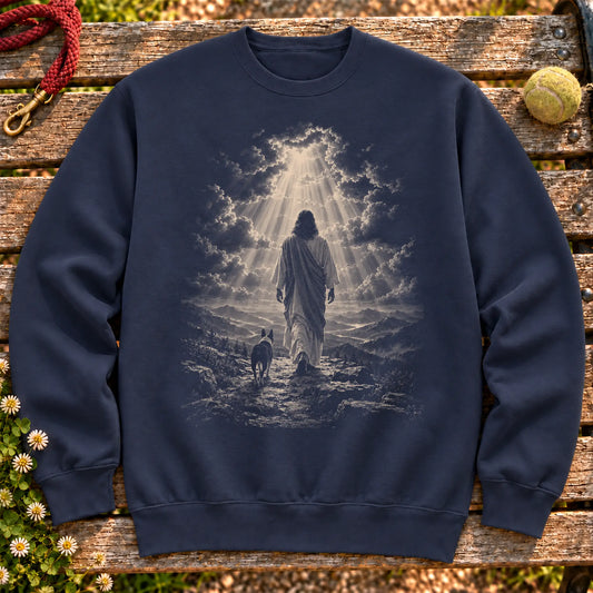 Navy crewneck sweatshirt showing Jesus walking beside a Boston Terrier beneath rays of light