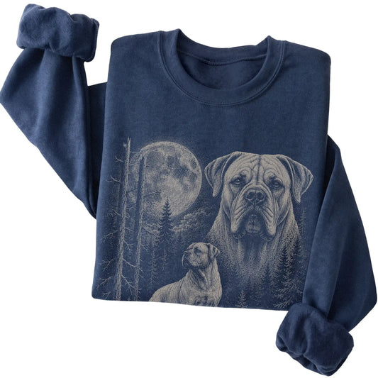 Folded navy crewneck sweatshirt showing the Mastiff Moonlit Forest graphic