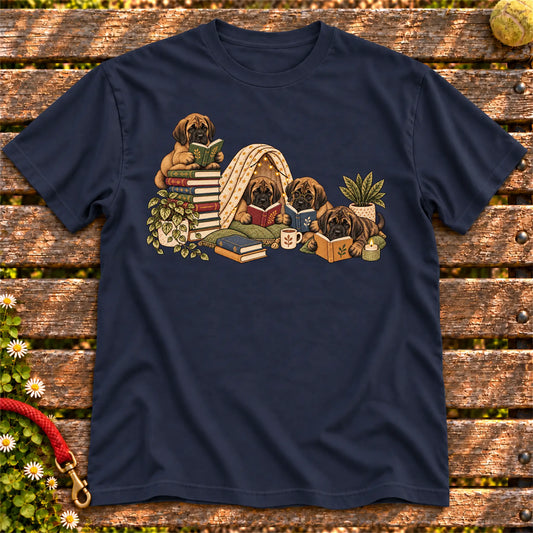 Mastiff puppies reading books in a cozy blanket fort on a Navy T-shirt