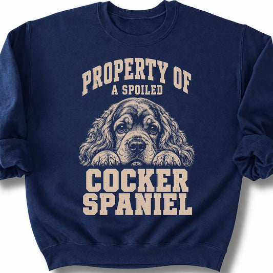 Navy Cocker Spaniel sweatshirt with a dog portrait and “Property of a Spoiled” lettering.
