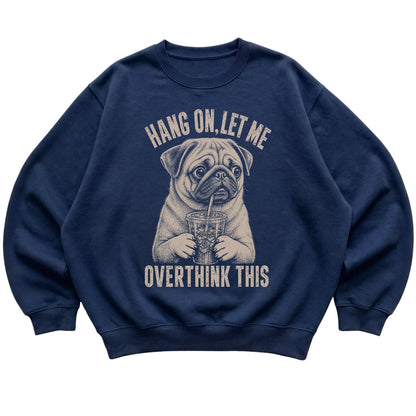 Navy crewneck sweatshirt featuring Overthinking Pug, laid-flat presentation
