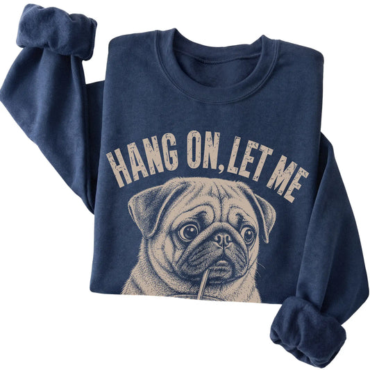 Navy crewneck sweatshirt featuring Overthinking Pug, folded presentation