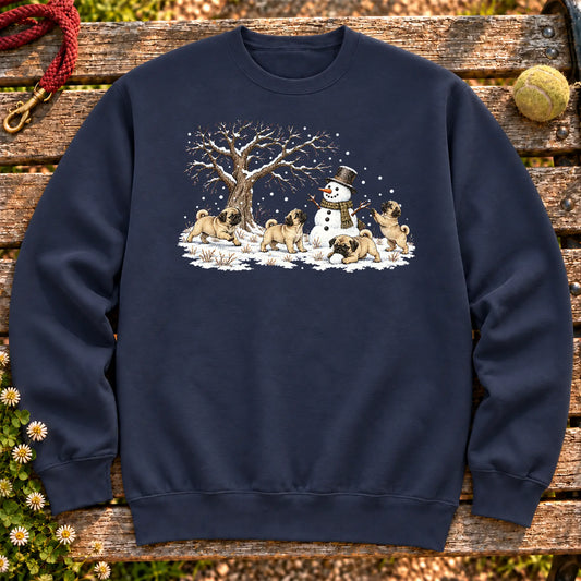 Pug puppies playing in snow with a snowman on a Navy sweatshirt