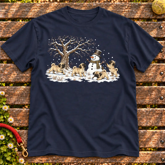 Pug puppies playing in snow with a snowman on a Navy T-shirt