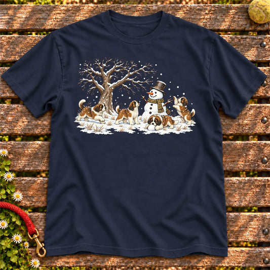 Saint Bernard puppies playing in snow with a snowman on a Navy T-shirt